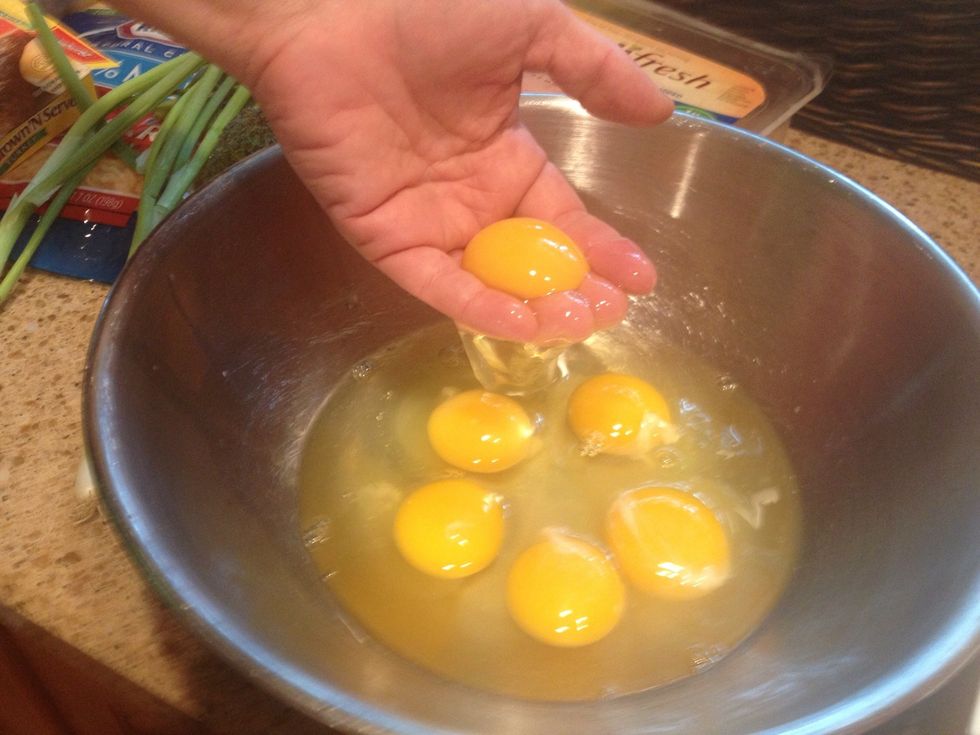 Start adding the ingredients into a mixing bowl- there is no particular order-I started with the eggs - 6 full eggs in, and pulled two yolks back out.