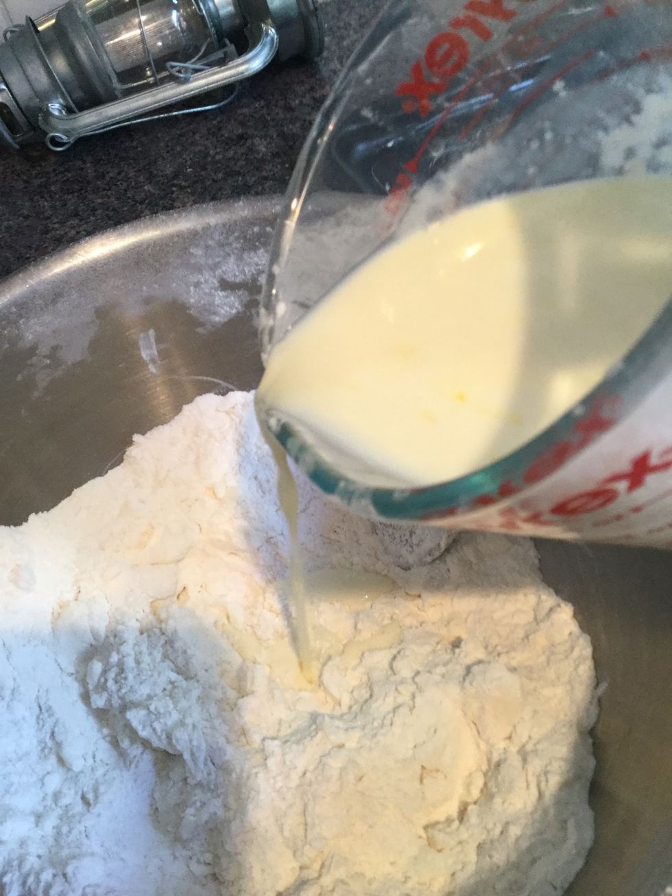 Start adding the milk mixture in slowly. You do not need to use all of the mixture, I used about 3/4 cup of it but it might be different for you, use as much as necessary until the mixture is moist.