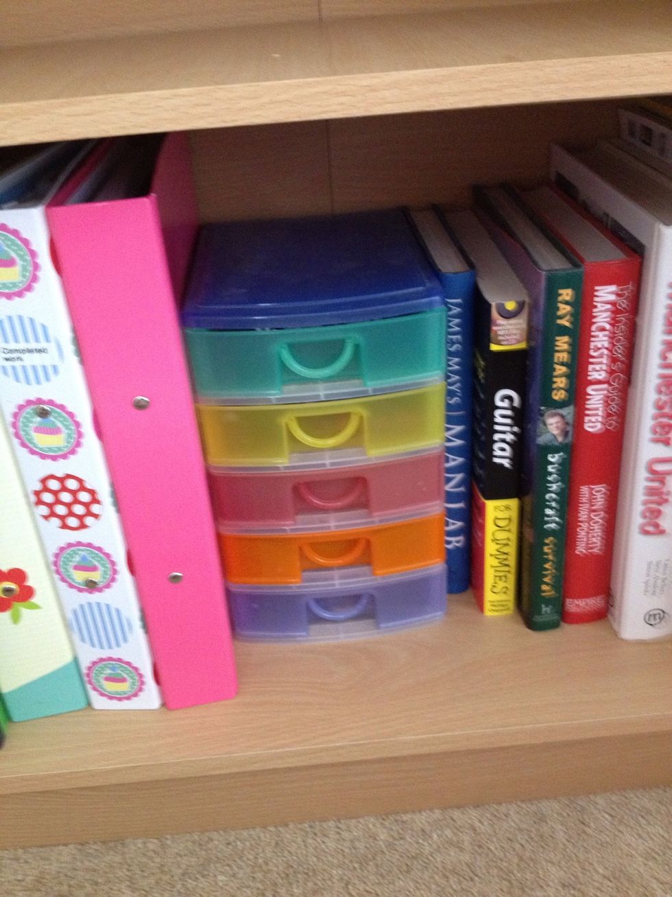 Start adding the rest of your stuff like a puzzle or giant game of Tetris, these little drawers fit nicely here and are great for holding little bits and bobs.