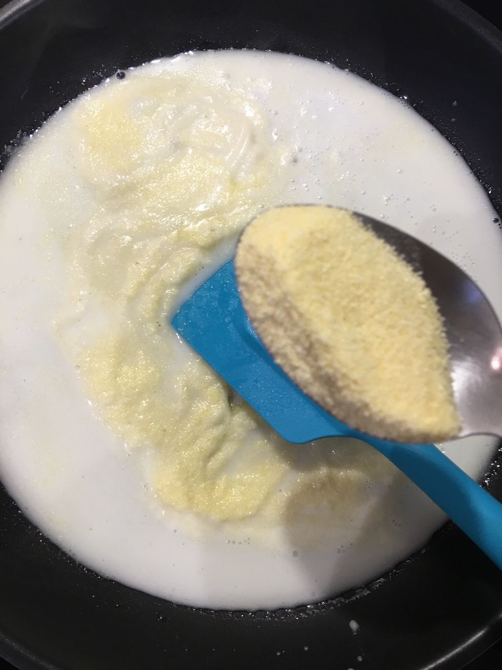 Start adding the semolina and stir.