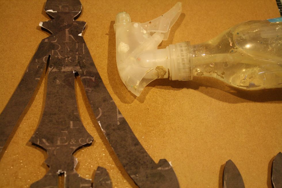 Start adding water to the paper. You don't want to soak the chandelier, just keep spritzing or spreading water with a sponge or towel until the paper is moist. I work small areas at a time.