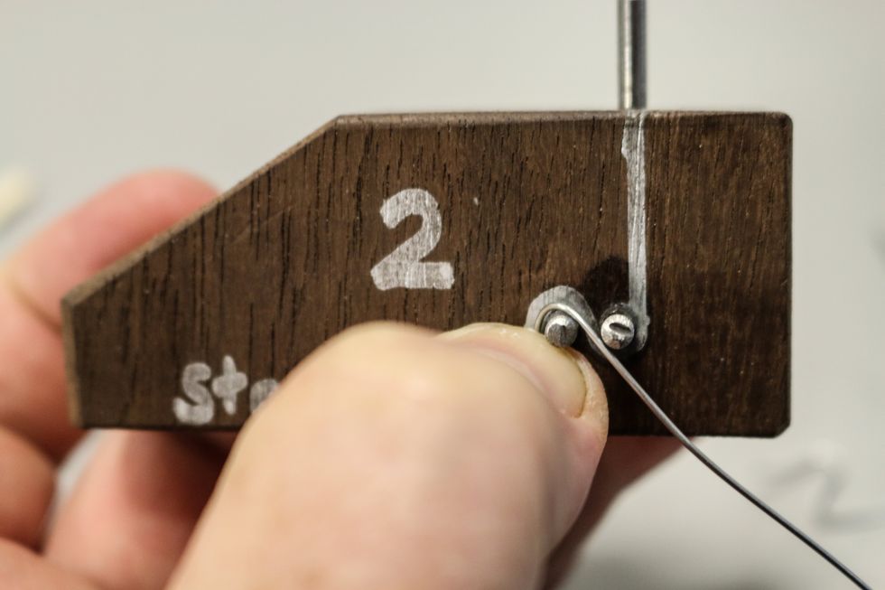 Start another piece of the steel wire on the opposite (side "2") of the jig. This wire will "mirror" the first wire.