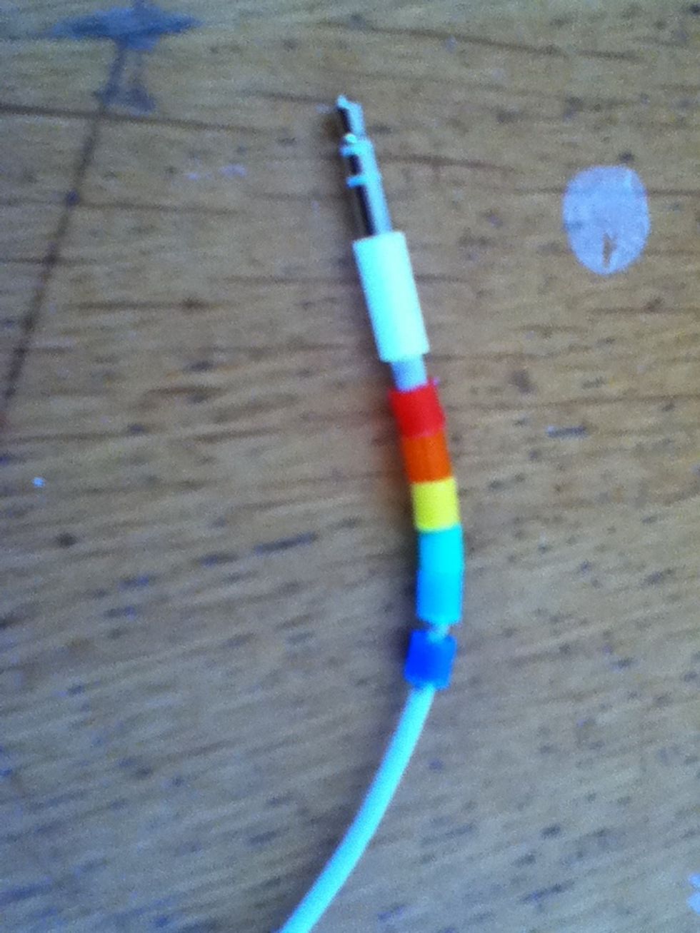 Start at the end of the headphones.