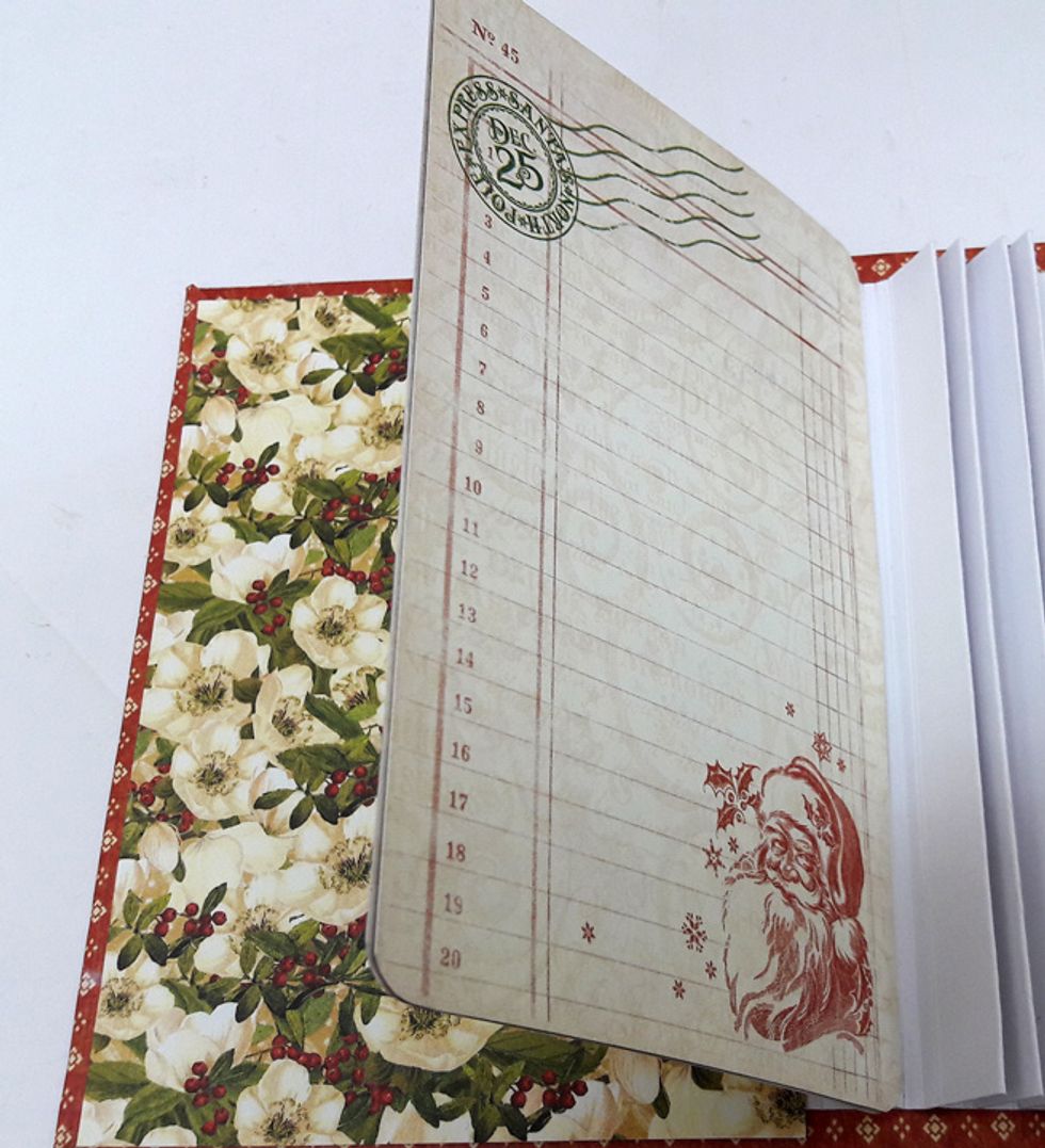 Start attaching the pages: Type 1 page: attach two large ephemera cards back to back while the binding flap is in-between them.