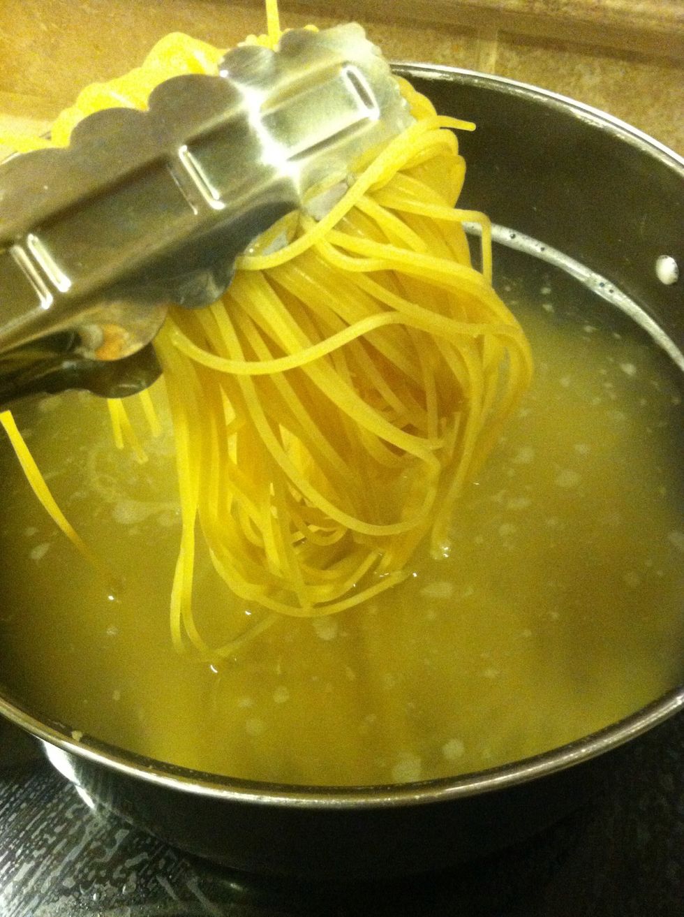 Start boiling pasta, cook al dente and strain