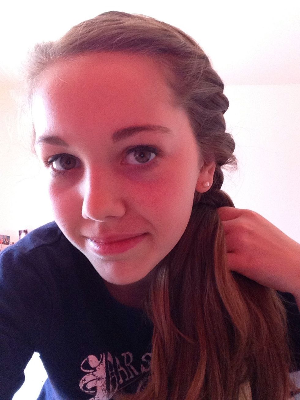 Start braiding by putting the section from the side in the middle