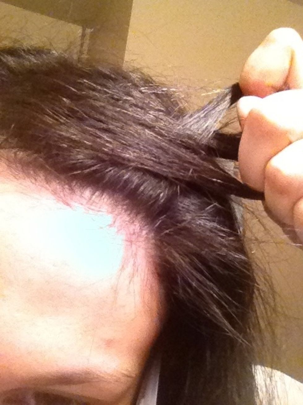 Start braiding, pulling hair underneath. This is a Dutch braid. Sorry I didn't make a video here but it's not easy to film and braid at once...