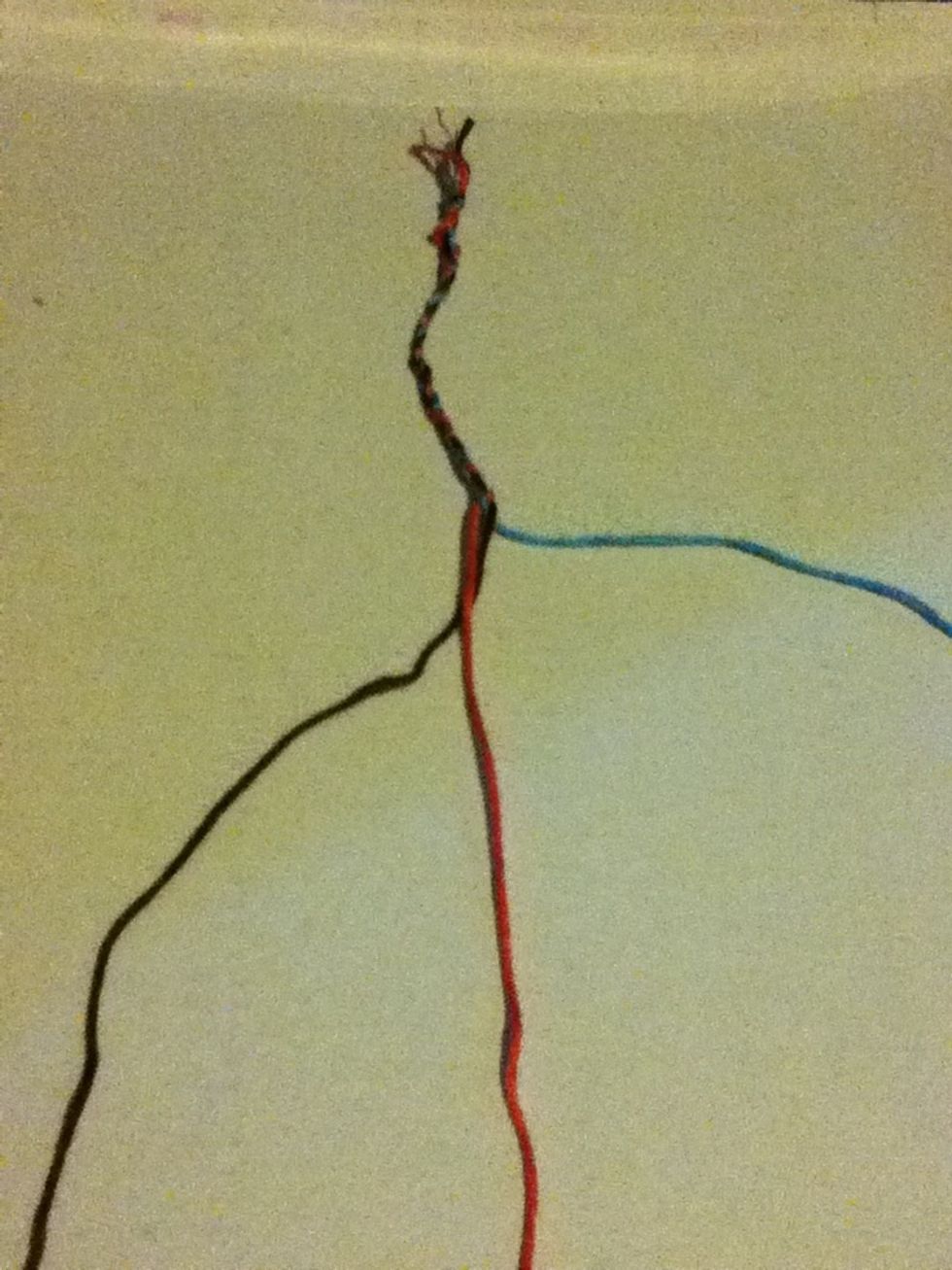 Start braiding the strings and pull them some what tight as you go along.