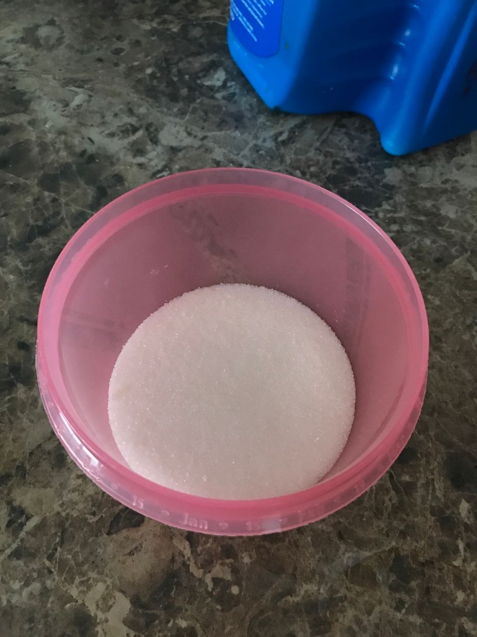 Start by adding as much sugar as desired in a mixing bowl