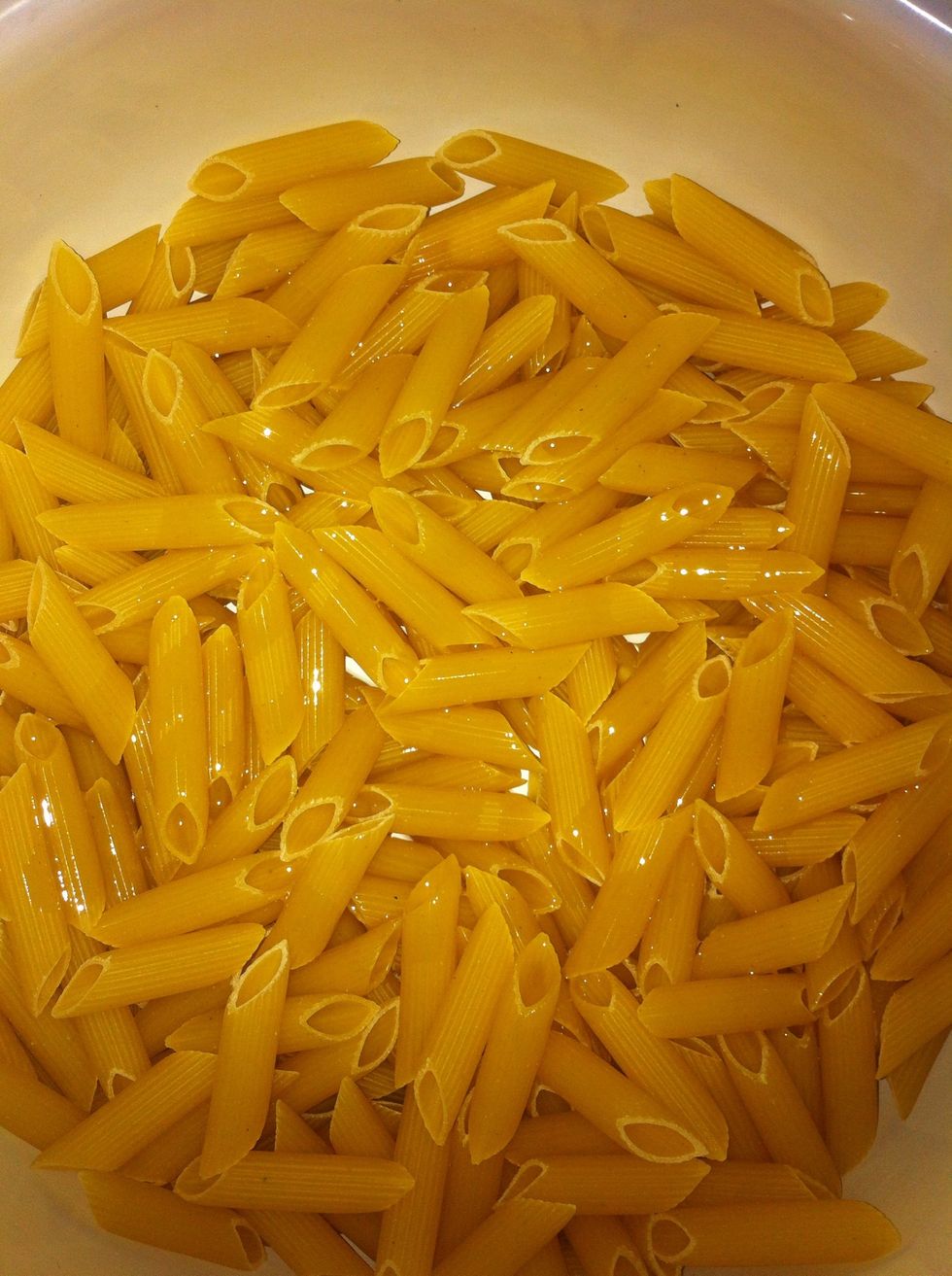 Start by adding pasta to a pot with a drizzle of oil.
