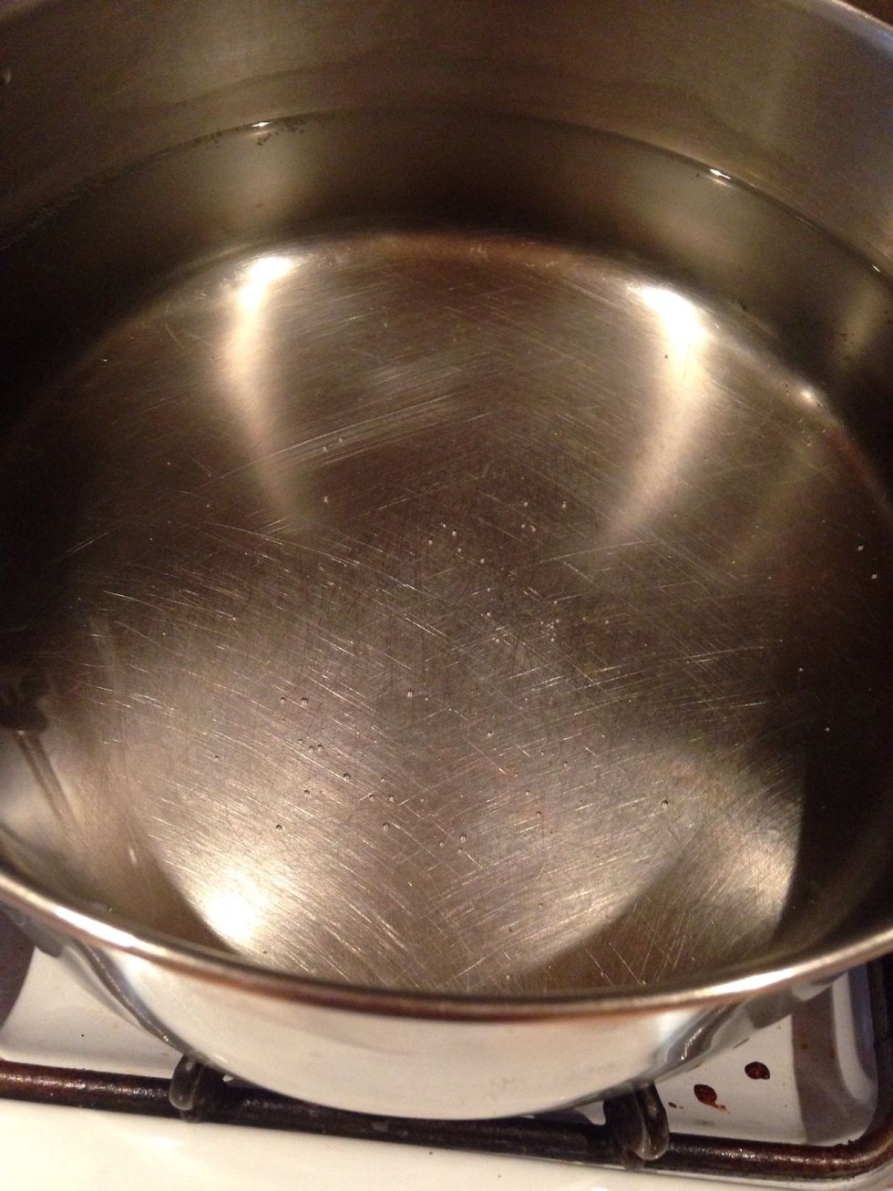 Start by bringing a pot of water to boil for the spaghetti.