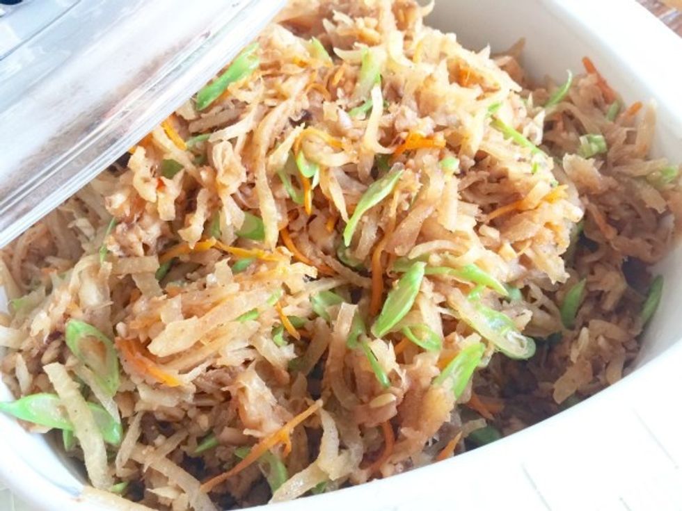 Start by cooking the yam bean filling for these steamed buns. Recipe for this is at http://www.huangkitchen.com/stir-fried-yam-bean/