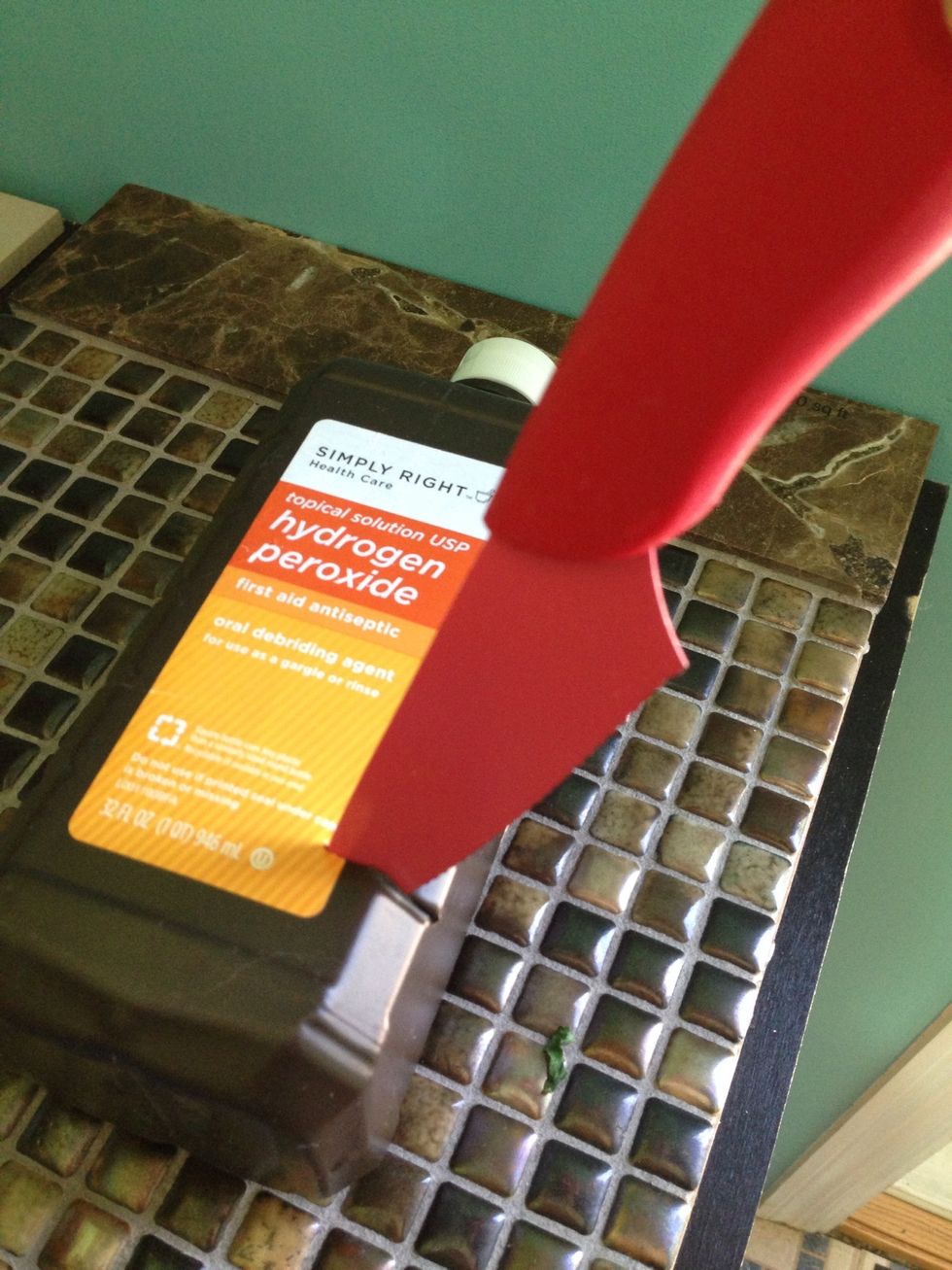 Start by cutting a hole to allow for scissor cutting.