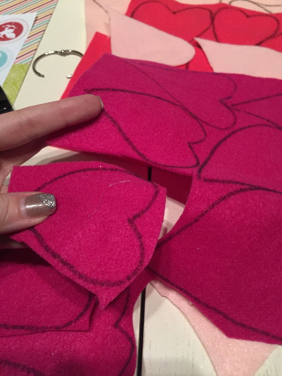 Start by cutting around the heart from the others.