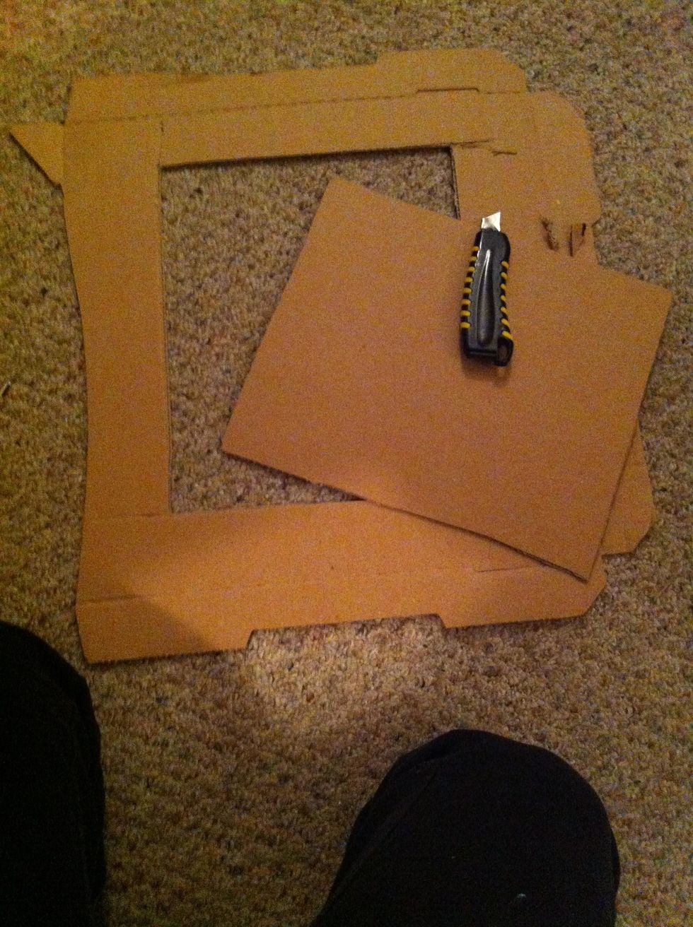 Start by cutting out your cardboard. You can cut it to any size you wish. I cut mine to 11X13. However, the bigger you cut it, the more Popsicle sticks you may need to make your frame.