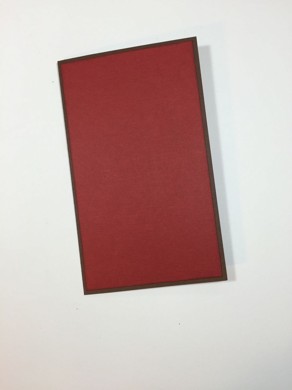 Start by cutting your card base from dark brown cardstock for a 4 1/2" x 7 1/2" card. Cut red cardstock 4 1/4" x 7 1/4" and adhere. (I have inked the edges with Walnut Stain Distress ink.)