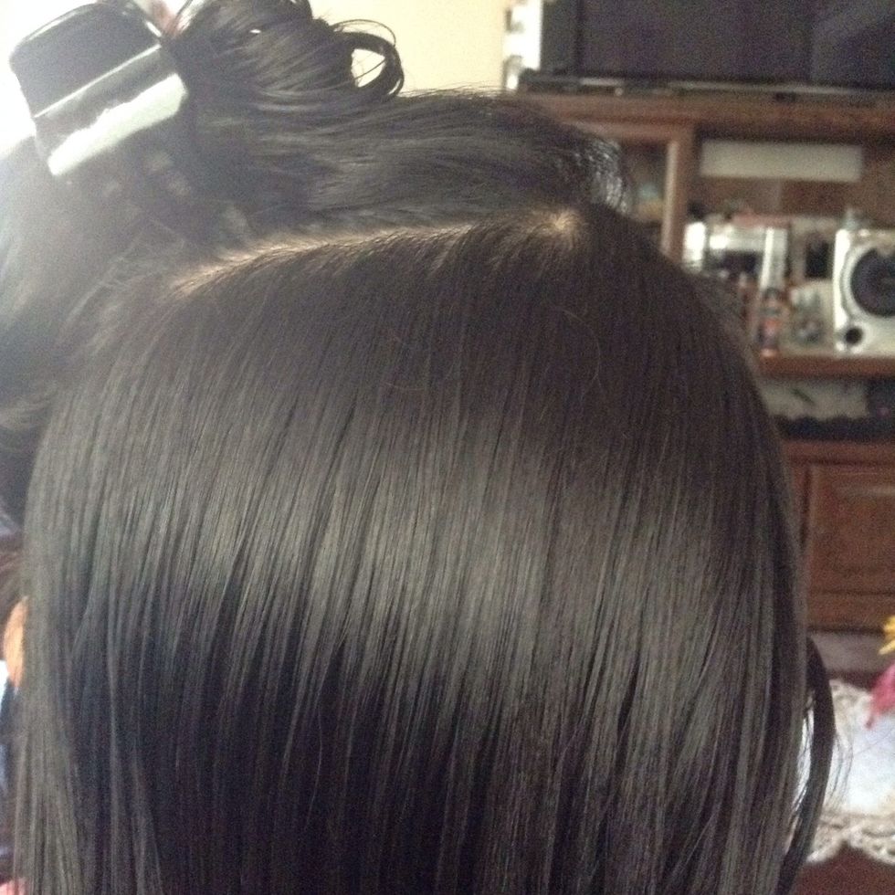 Start by dividing a small section of your hair