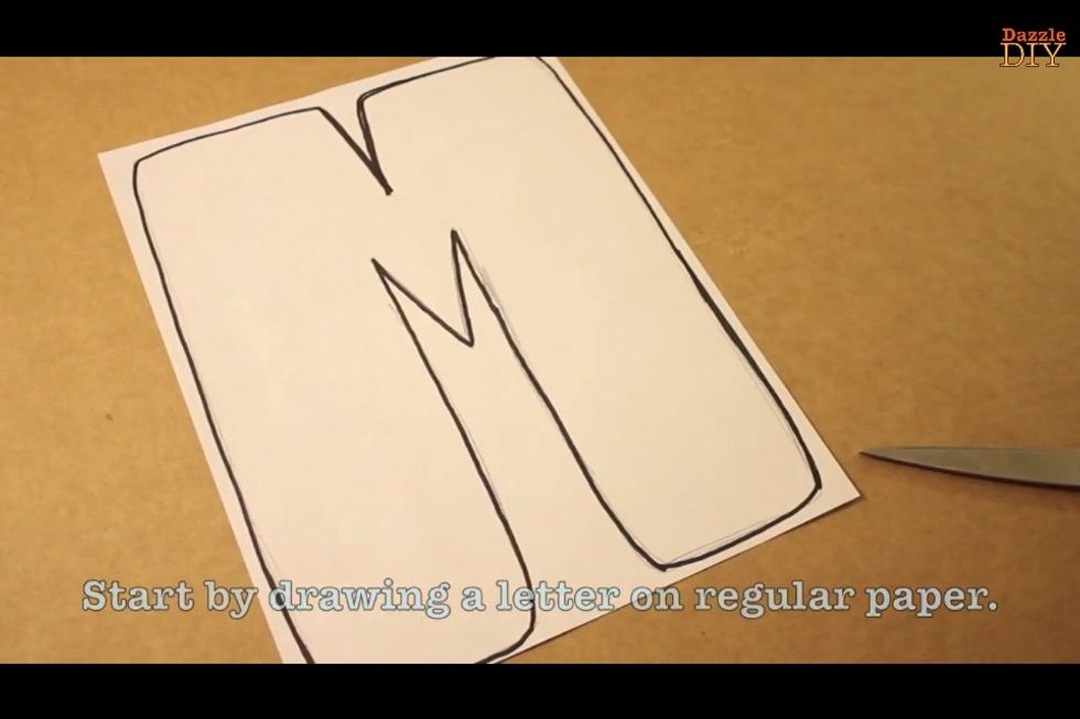 Start by drawing a letter on a regular paper