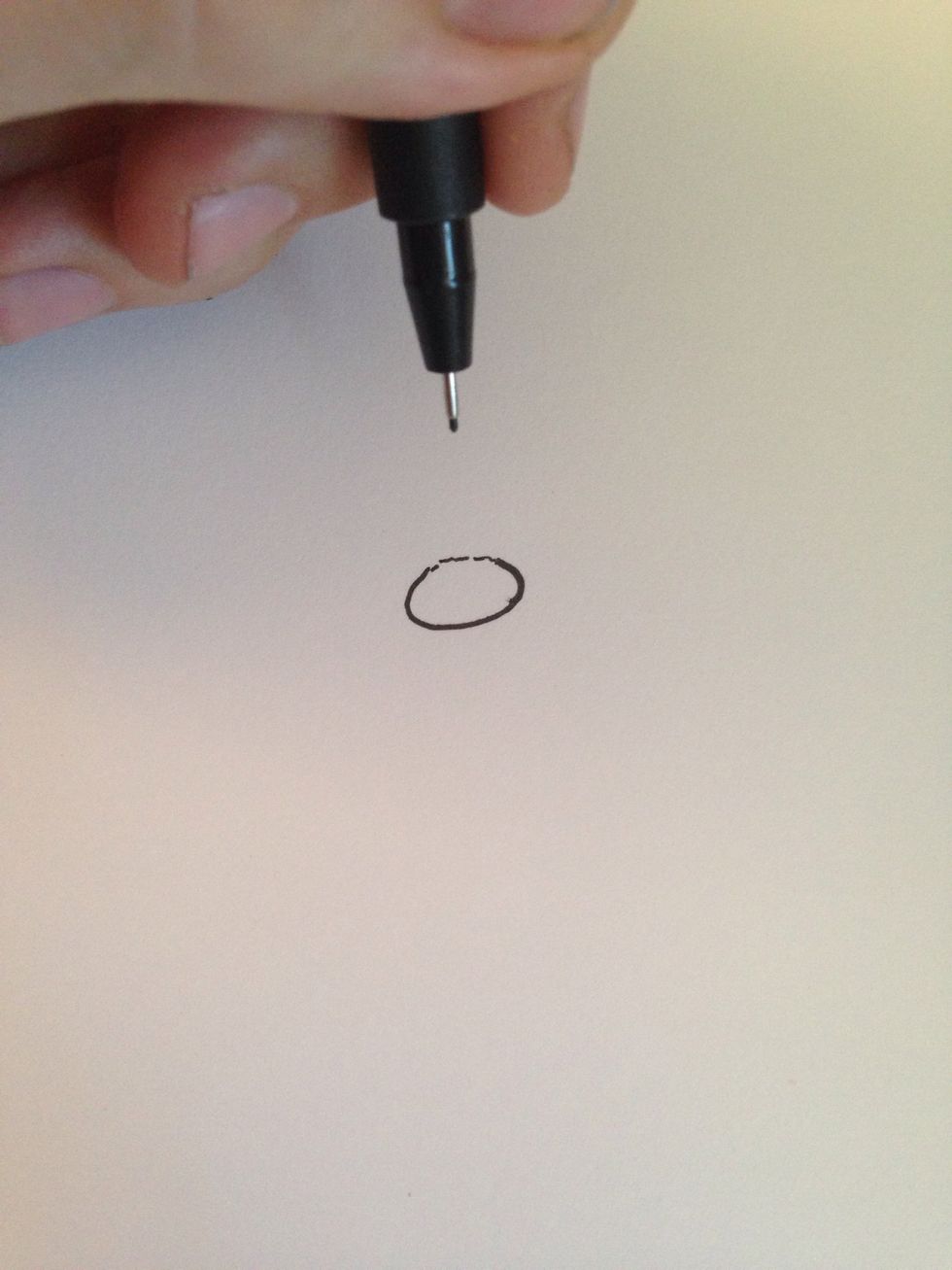 Start by drawing an oval. This is the center of the daisy.