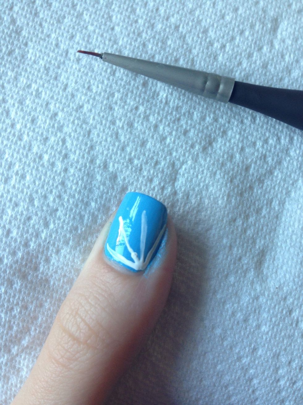 Start by drawing four lines from the corner of your nail