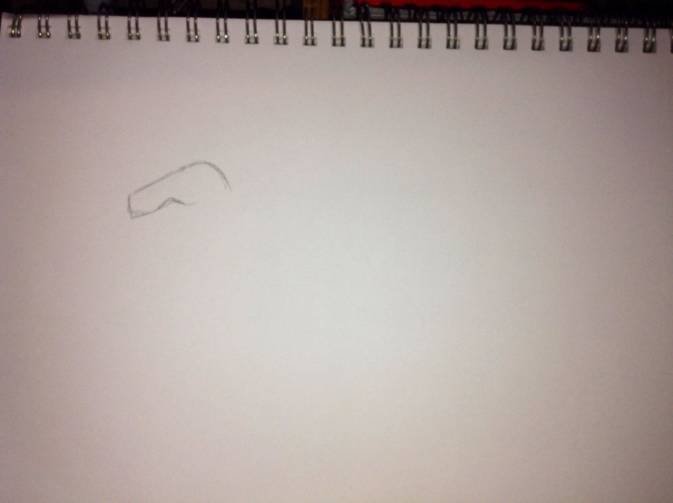 Start by drawing the top half of the head.