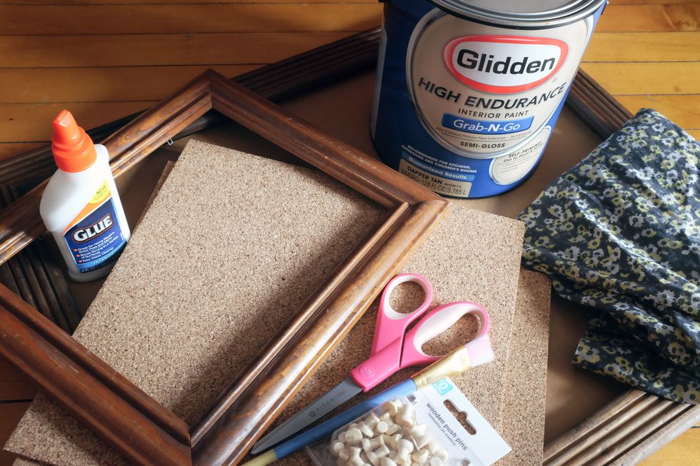 Start by gathering your supplies. Everything, including the Glidden paint, is available at Walmart. You can also find interesting old frames at garage sales or thrift shops.