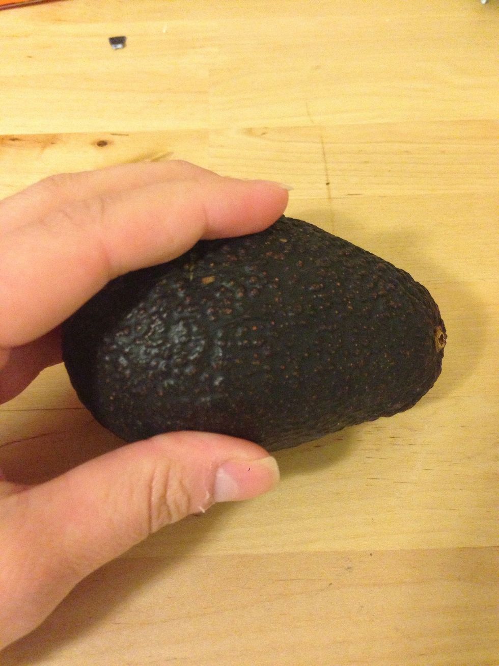Start by gently pressing on the avocado. You want the avocado to have a little give, aka squishy, but not too much. The more squishy the avocado, the more ripe it is.