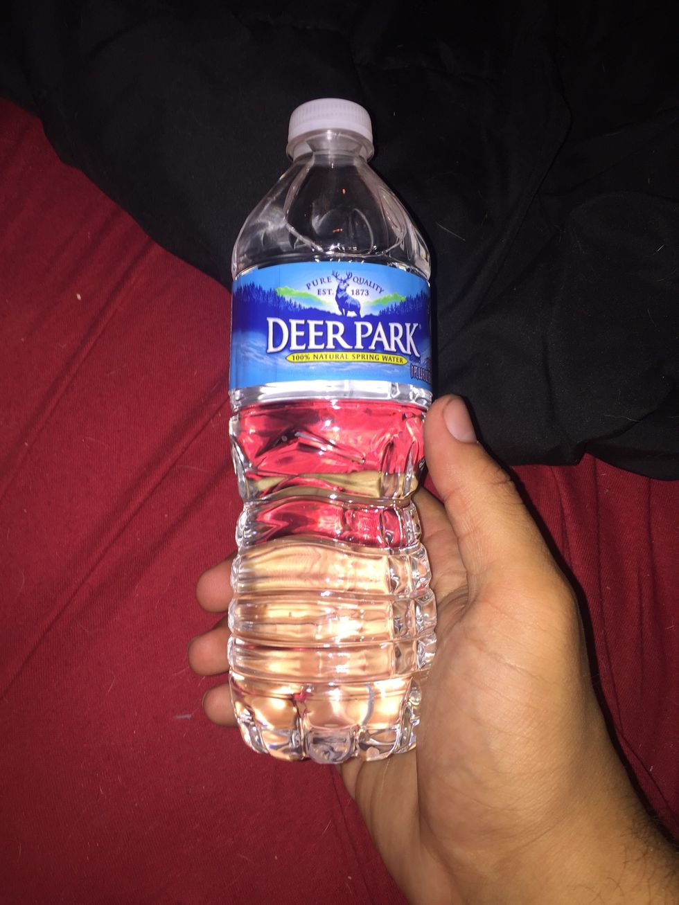 Start by getting an empty water bottle. This bottle was not empty, but I assure you I drank the sumbitch' straight down.