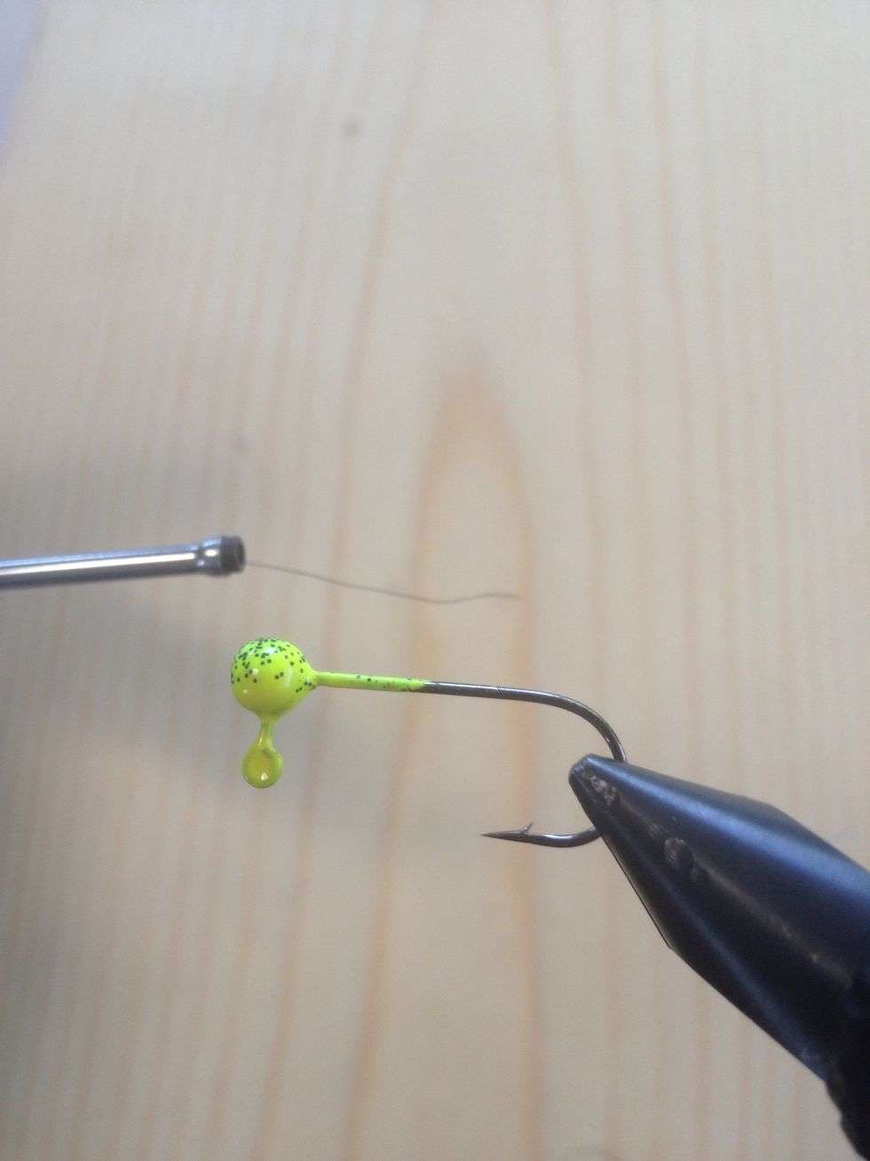 Start by laying the thread down the hook shank.