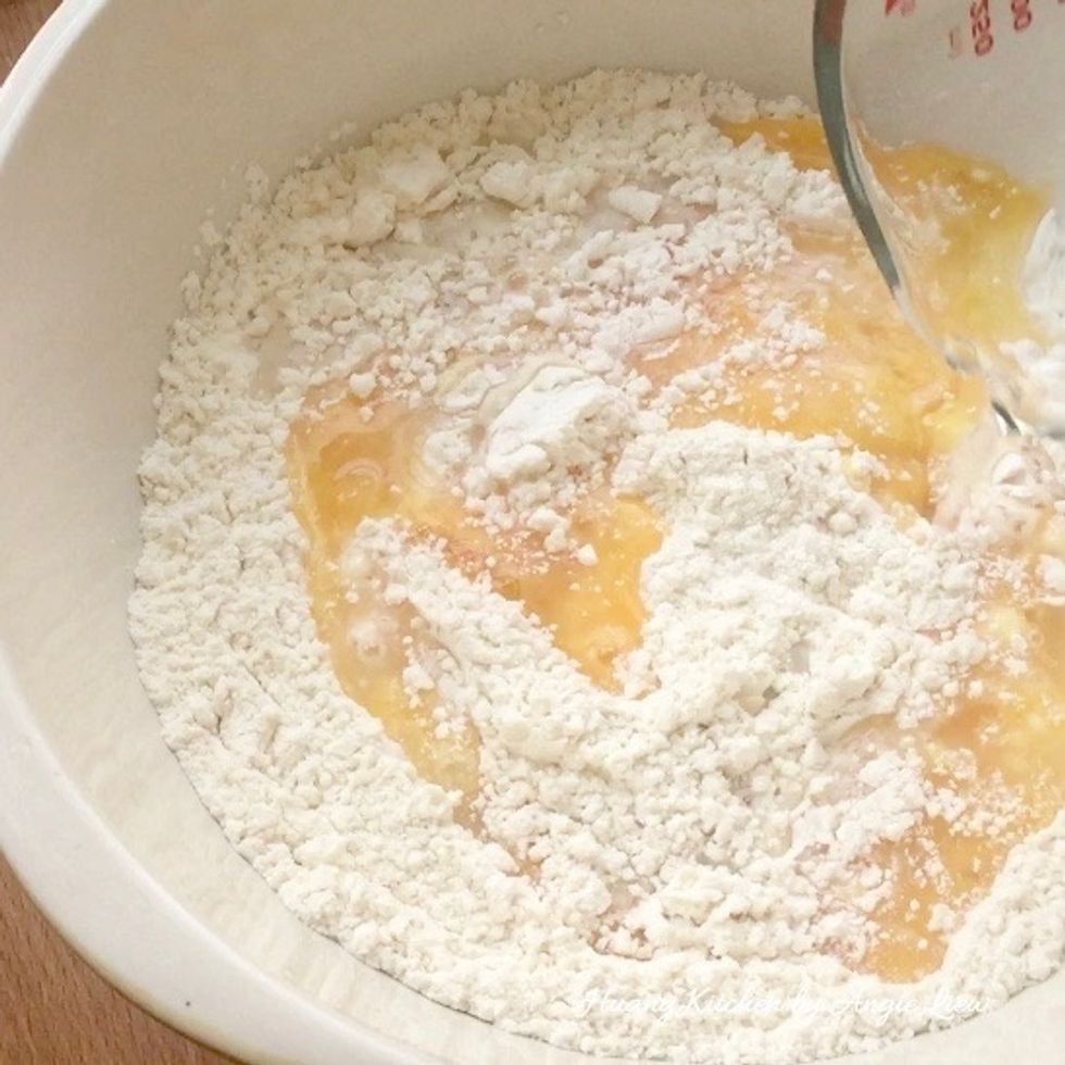 Start by making the WATER dough. Combine sifted flour, salt, lightly beaten eggs and water in a large mixing bowl and knead to form a soft dough.