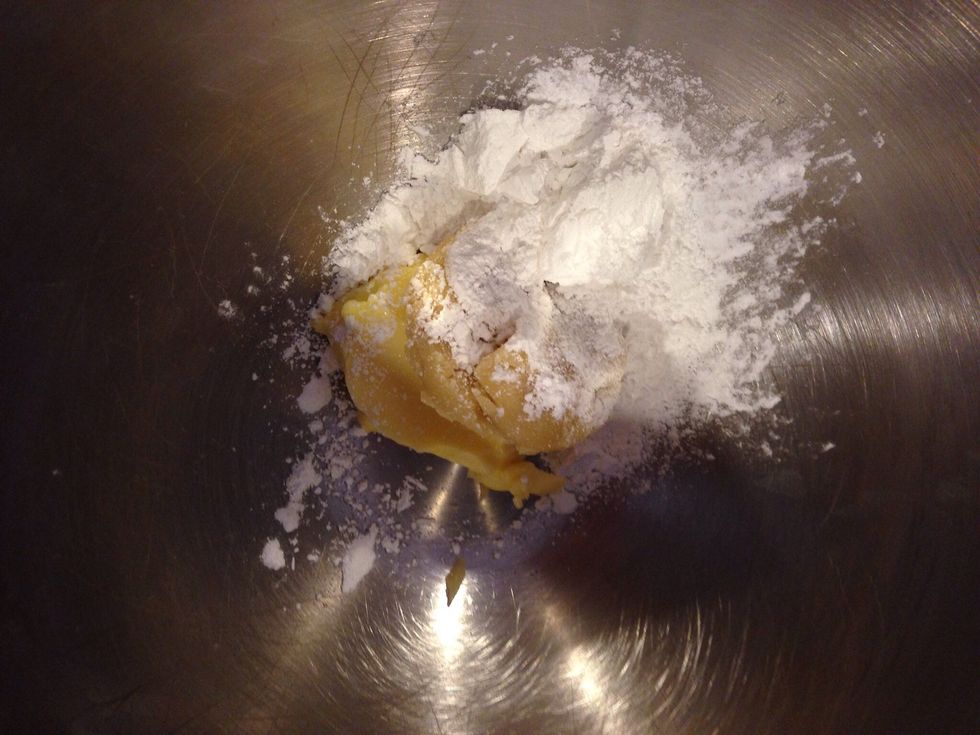 Start by making your almond filling, combined powdered sugar, almond paste, and butter in a bowl.