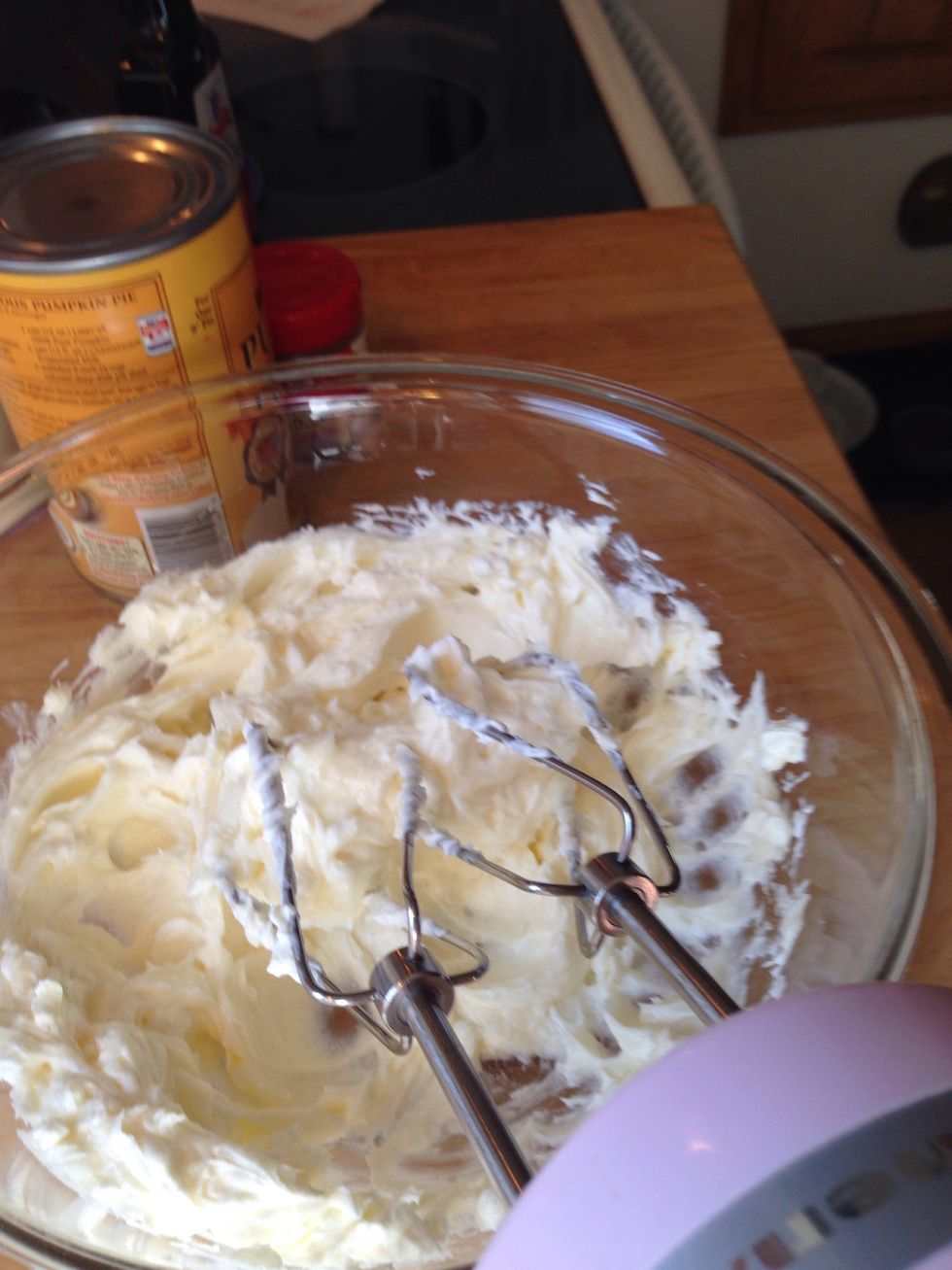 Start by mixing the sugar and cream cheese together at low speed.