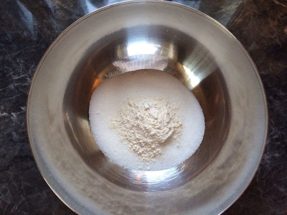 Start by mixing the sugar and the flour