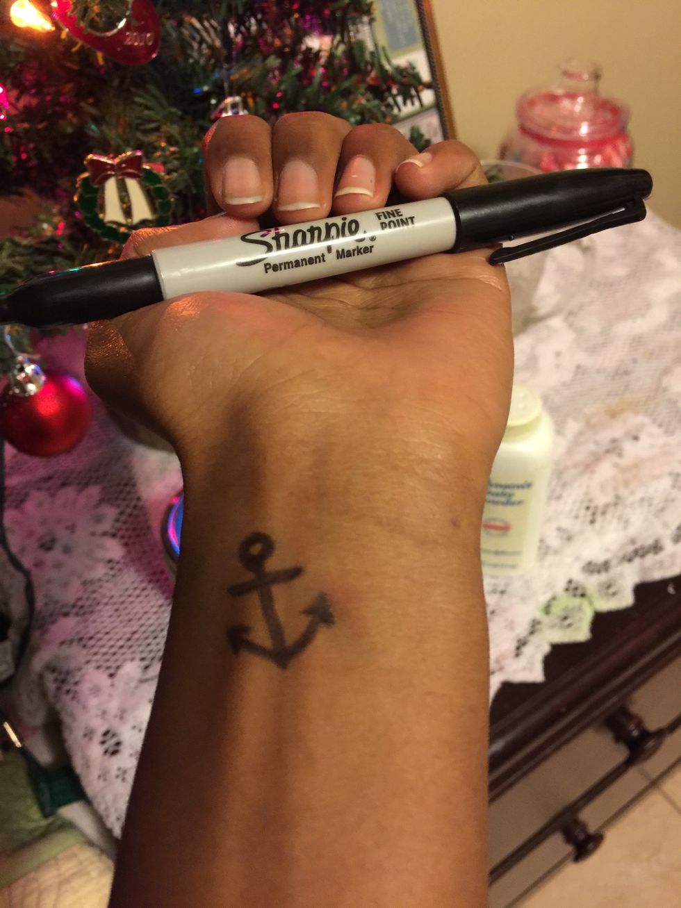 Start by outlining your tattoo with a sharpie