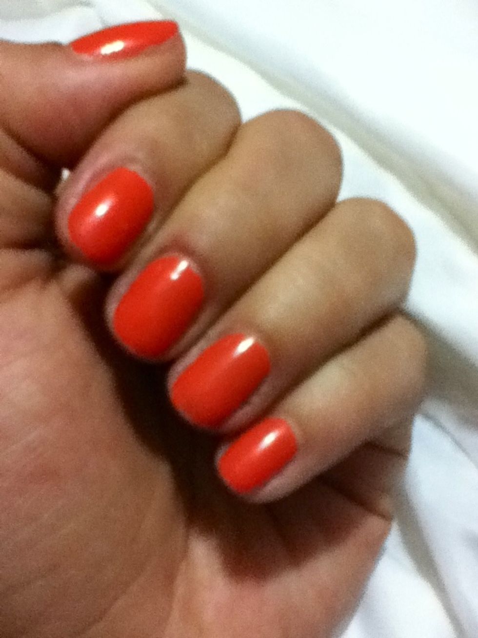 Start by painting your nails orange. And don't forget your base coat!!