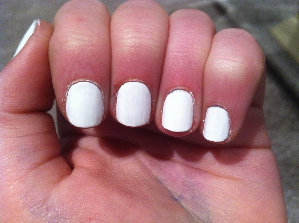 Start by painting your nails white.
