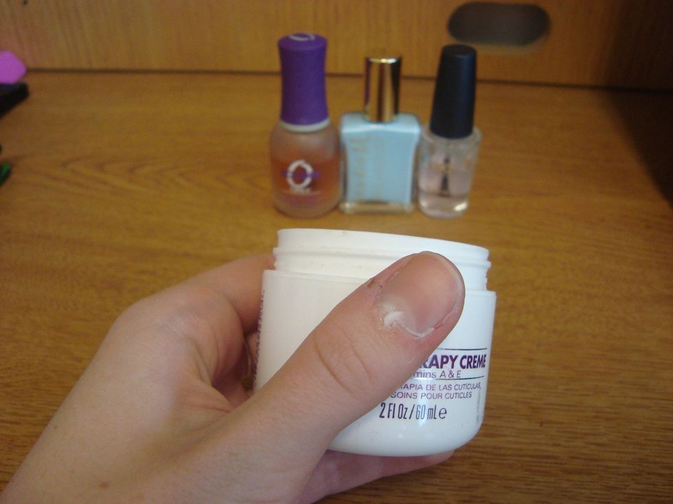 Start by pampering your cuticles with some good cuticle cream. Rub in well.