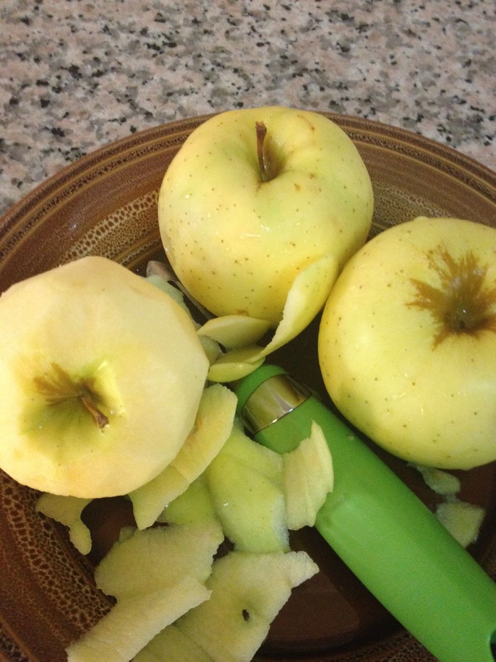 Start by peeling the apples