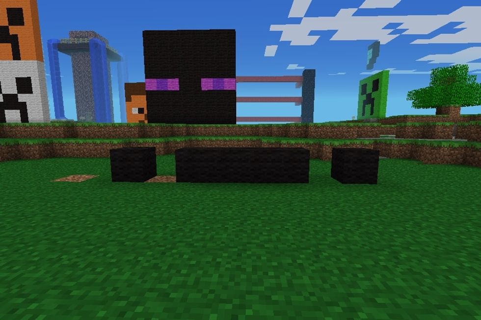 Start by placing 1 black wool leave a space place 4 black wool level a space and place 1 more black wool