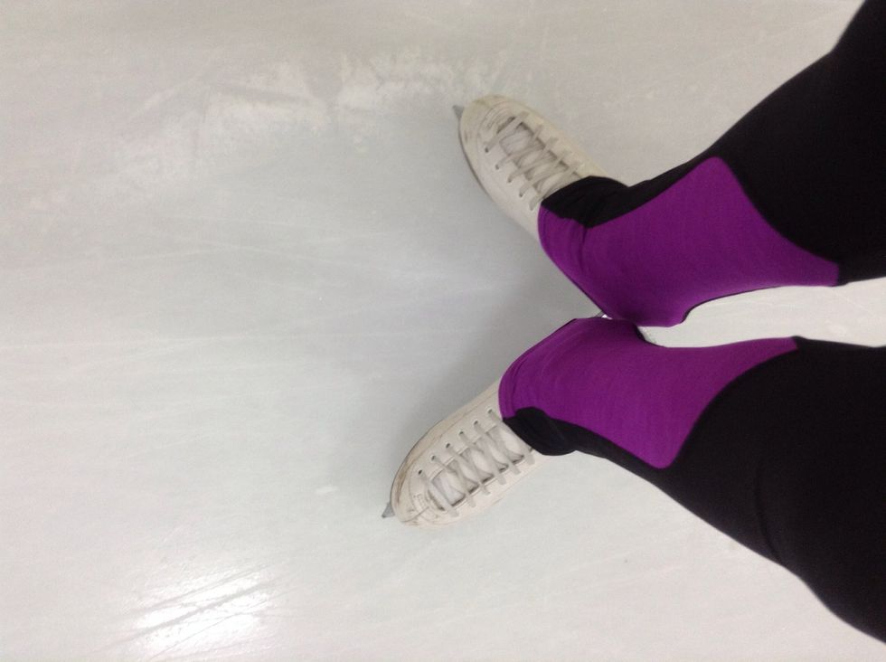 Start by putting your heels together to create a v-shape with your skates.