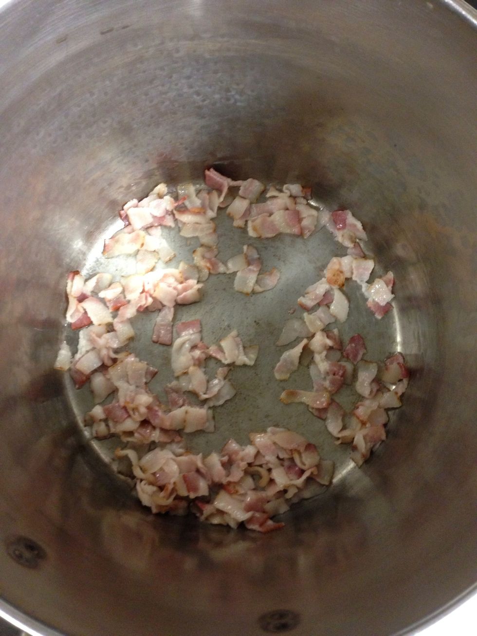 Start by rendering bacon, cold pan and low heat and render fat, the bacon will foam when finished Then set aside bacon bits.