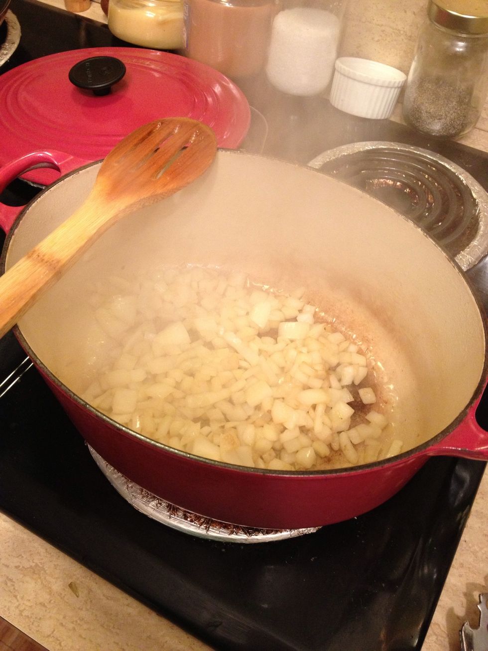 Start by saut\u00e9ing the onion on medium-high with EVOO until slightly brown and translucent. About 2-3 minutes.