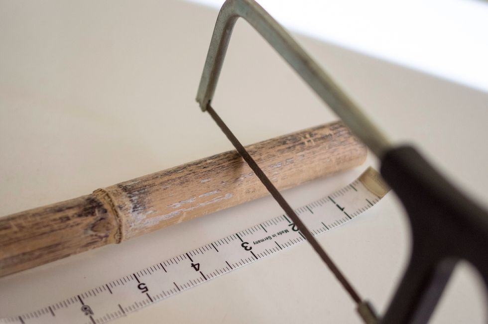 Start by sawing bamboo.