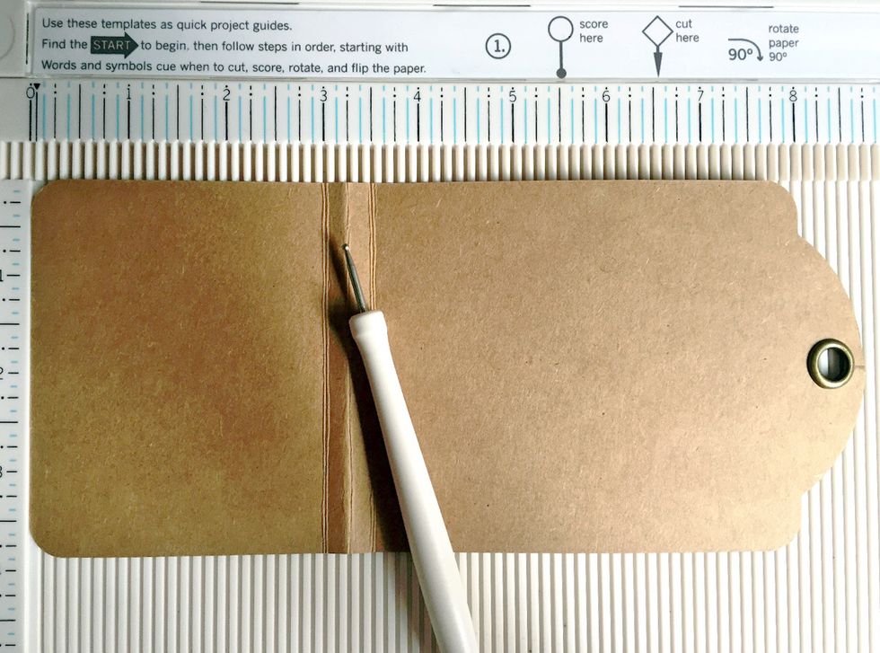 Start by scoring the large tag at 3", 3.25" and 3.5" as shown...