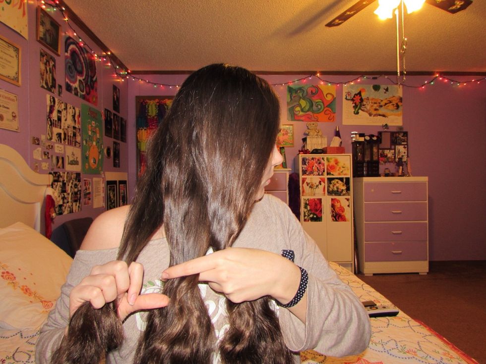 Start by sectioning your hair into 3 equal parts...