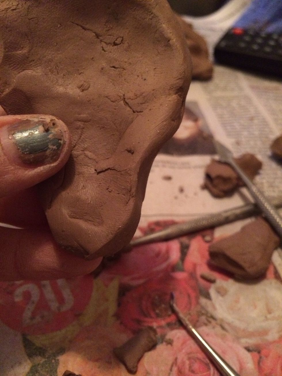 Start by shaping the ear lobe.