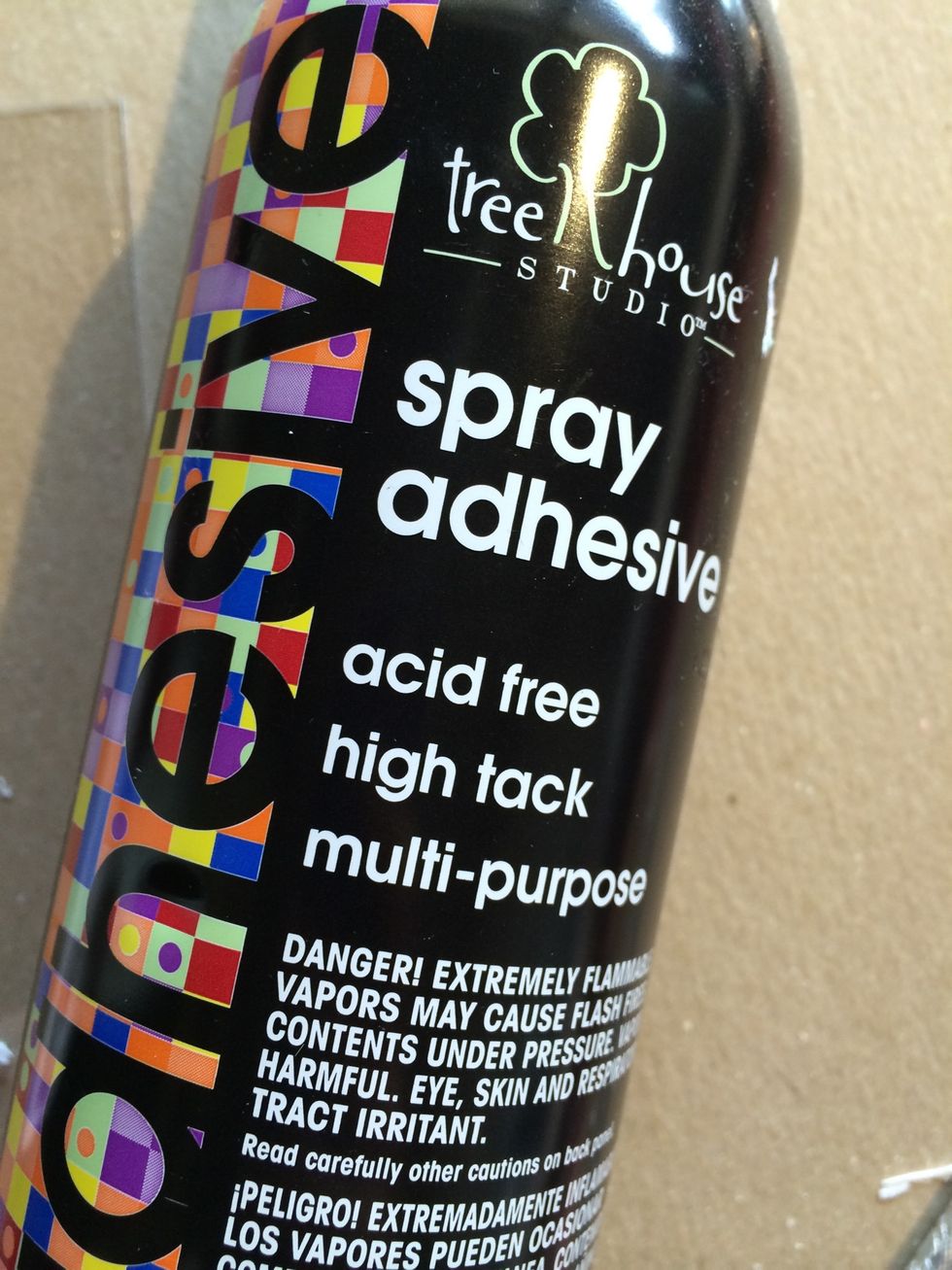 Start by spraying your foam with a good dose of spray adhesive. IMPORTANT TO REMEMBER: once glued down, your image will need to be reversed, so make sure you add your adhesive to the correct side!