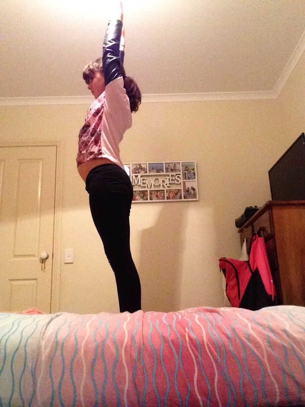 Start by standing with ur hands up on ur ears and do this in a safe spot