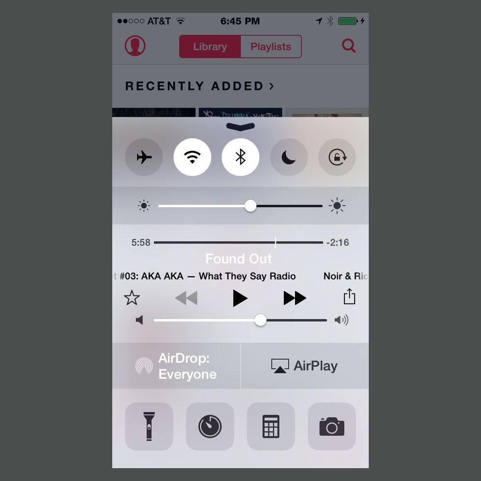 Start by syncing your iPhone to your Mac via AirPlay. Swipe up from the bottom of your phone and select AirPlay.
