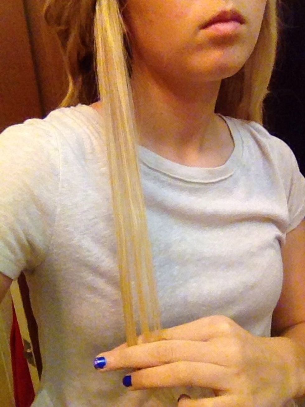 Start by taking a small amount of hair.